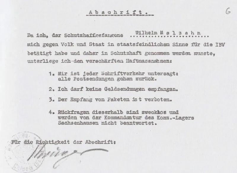 Abschrift eines undatierten von Wilhelm Malzahn unterschriebenen Formulars aus dem KZ Sachsenhausen, das besagt, dass er seinem Glauben treu blieb und aus diesem Grund verschärfte Haftmaßnahmen erdulden musste.
